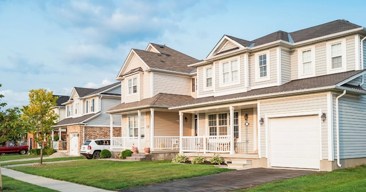 Row of suburban homes with pitched roofs